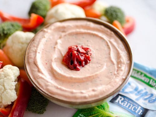 Roasted Red Pepper Ranch Dip is an easy appetizer with light cream cheese, Greek yogurt, and Hidden Valley Ranch, perfect for dipping with your favorite veggies or crackers!