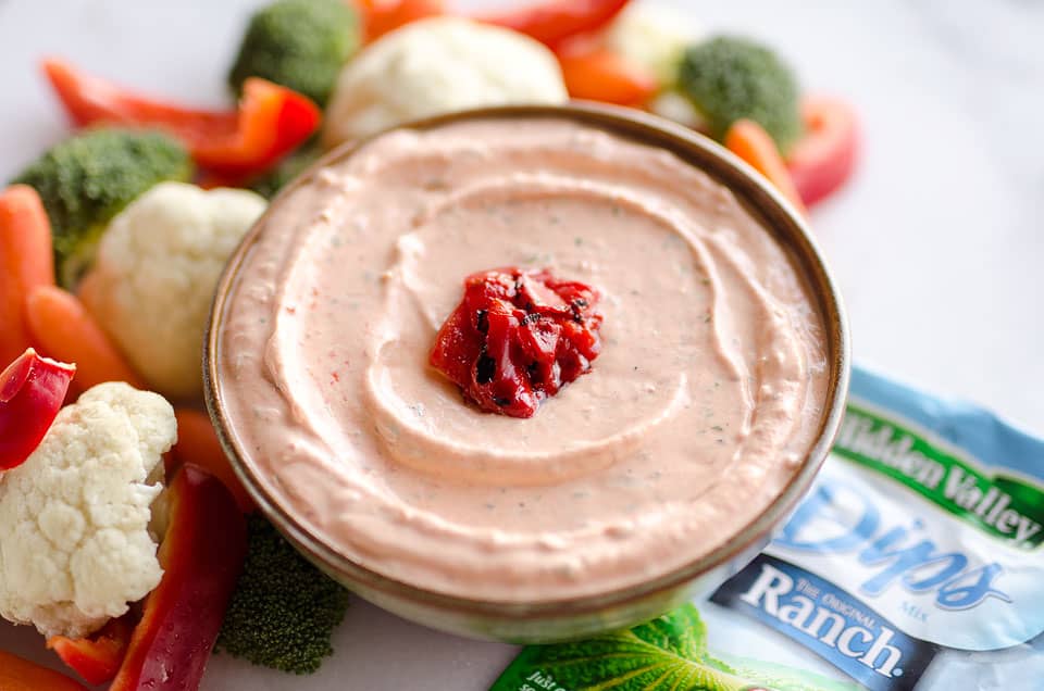 Roasted Red Pepper Ranch Dip is an easy appetizer with light cream cheese, Greek yogurt, and Hidden Valley Ranch, perfect for dipping with your favorite veggies or crackers!