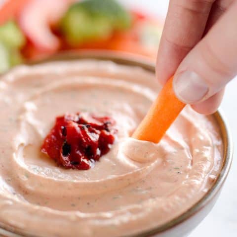 Roasted Red Pepper Ranch Dip is an easy appetizer with light cream cheese, Greek yogurt, and Hidden Valley Ranch, perfect for dipping with your favorite veggies or crackers!