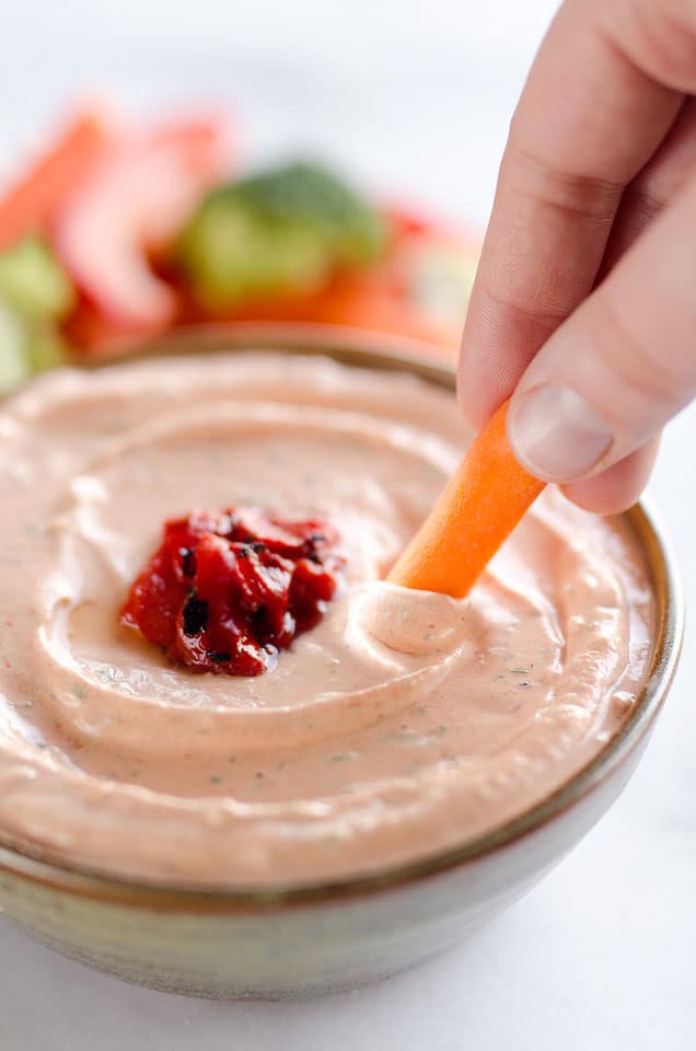 Roasted Red Pepper Ranch Dip is an easy appetizer with light cream cheese, Greek yogurt, and Hidden Valley Ranch, perfect for dipping with your favorite veggies or crackers!