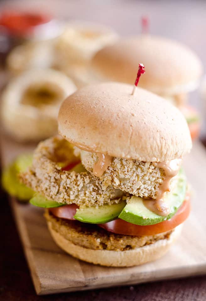 Skinny Cowgirl Veggie Burger is a hearty and healthy vegetarian meal perfect for Meatless Monday. Your favorite veggie burger is topped with homemade baked onion rings smothered in a Greek yogurt and BBQ sauce for bold flavor and crunch.