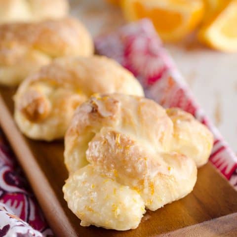 Sweet Roll Orange Knots are an easy and delicious breakfast idea that have all the flavors and light airy texture of a homemade dough, but are made easy with store-bought sweet roll dough!