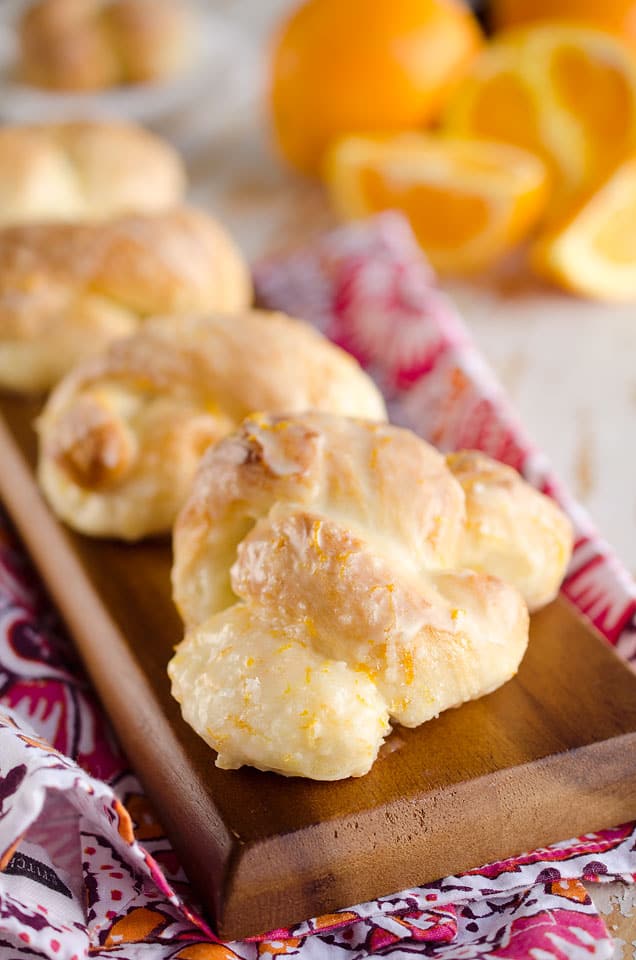 Sweet Roll Orange Knots are an easy and delicious breakfast idea that have all the flavors and light airy texture of a homemade dough, but are made easy with store-bought sweet roll dough!