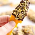 Chocolate & Pistachio Dried Mangoes are an easy and healthy treat to satisfy your sweet tooth! With only 3 ingredients, this delicious snack comes together in no time and is perfect for on the go.