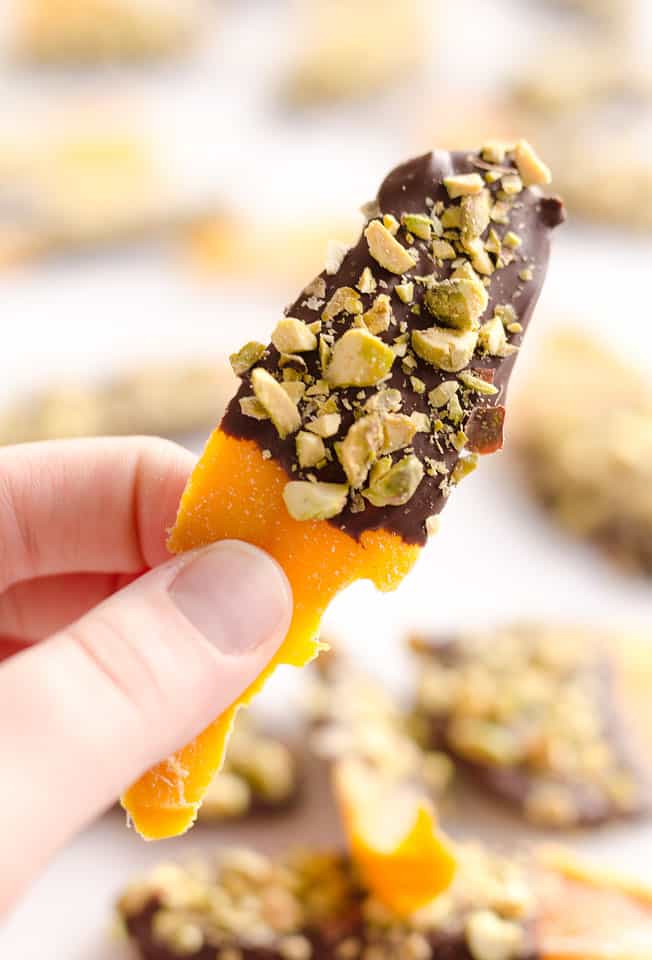 Chocolate & Pistachio Covered Mangoes are an easy and healthy treat to satisfy your sweet tooth! With only 3 simple ingredients, this delicious snack comes together in no time and is perfect for on the go. 