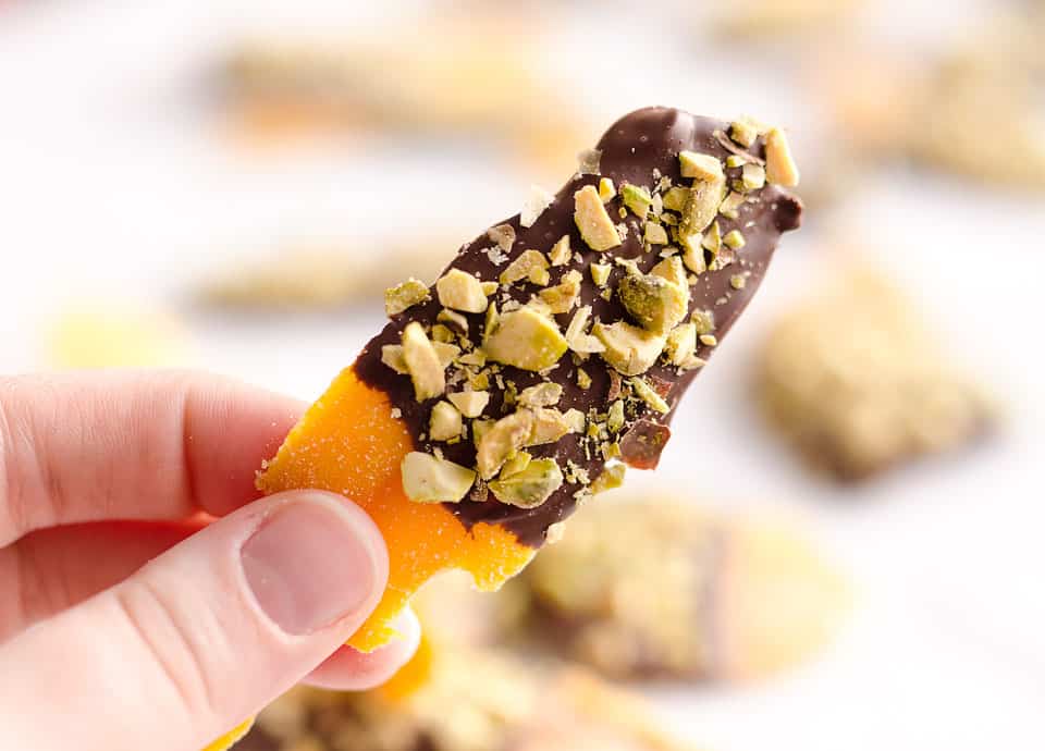 Chocolate & Pistachio Covered Mangoes are an easy and healthy treat to satisfy your sweet tooth! With only 3 simple ingredients, this delicious snack comes together in no time and is perfect for on the go. 
