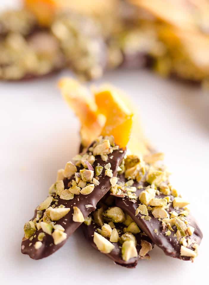 Chocolate & Pistachio Covered Mangoes are an easy and healthy treat to satisfy your sweet tooth! With only 3 simple ingredients, this delicious snack comes together in no time and is perfect for on the go. 