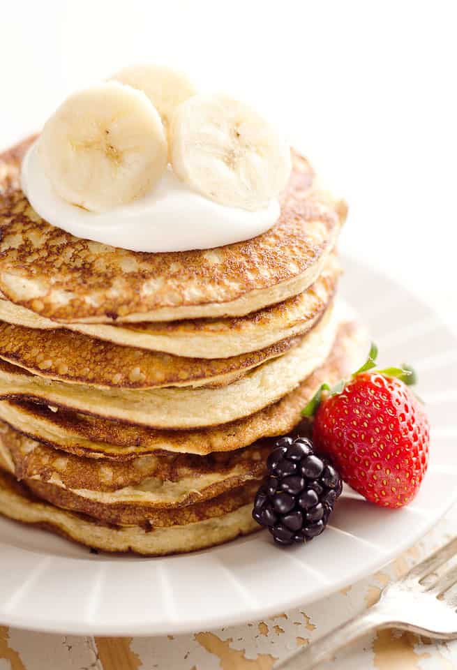 Light & Fluffy Banana Protein Pancakes are a healthy breakfast with five simple ingredients that taste amazing and fill you up! Egg whites, protein powder and ripe bananas make up these low-fat and low-carb pancakes, for a complete and wholesome meal under 200 calories.