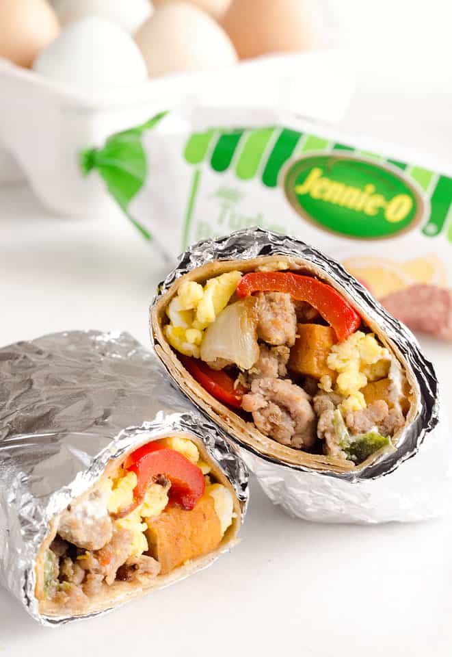 Light & Spicy Turkey Sausage Breakfast Burritos are a healthy freezer-friendly breakfast full of lean Jennie-O turkey sausage, scrambled eggs and roasted vegetables. Grab one from the freezer for a quick protein packed meal on the go or sit down with it to enjoy a hearty breakfast.