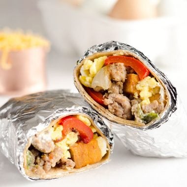 Light & Spicy Turkey Sausage Breakfast Burritos are a healthy freezer-friendly breakfast full of lean Jennie-O turkey sausage, scrambled eggs and roasted vegetables. Grab one from the freezer for a quick protein packed meal on the go or sit down with it to enjoy a hearty breakfast.