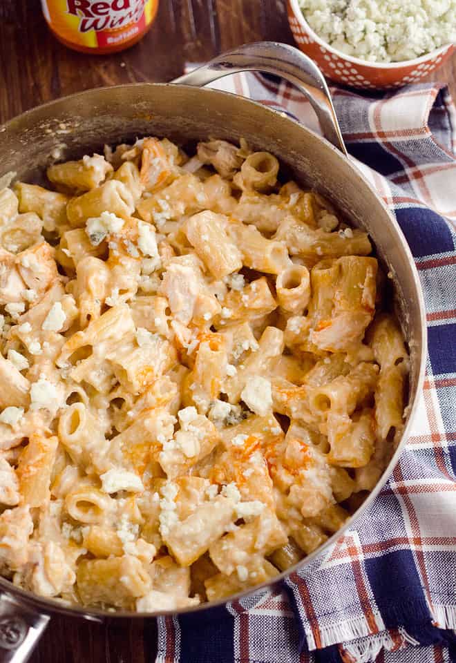 One-Pot Creamy Buffalo Chicken Pasta is a quick and easy 30 minute weeknight dinner with rich creamy pasta, spicy buffalo sauce and tender chicken. 