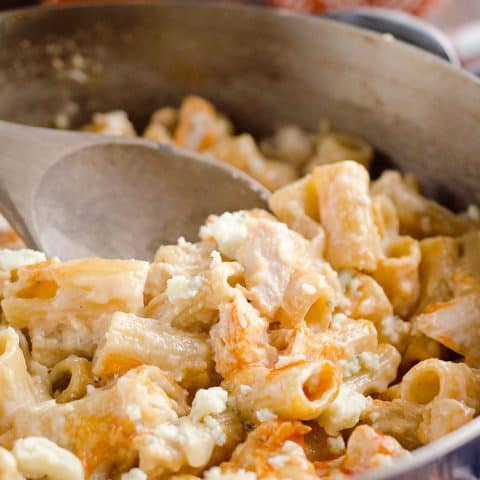 One-Pot Creamy Buffalo Chicken Pasta is a quick and easy weeknight dinner with rich creamy pasta, spicy buffalo sauce and tender chicken.