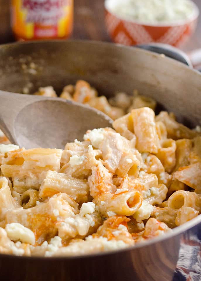 One-Pot Creamy Buffalo Chicken Pasta is a quick and easy 30 minute weeknight dinner with rich creamy pasta, spicy buffalo sauce and tender chicken. 