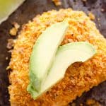 {3 Ingredient} Cheesy Dorito Chicken is a light and delicious dinner with tender chicken breasts stuffed with a creamy queso fresco cheese and coated in crunchy Dorito chips.