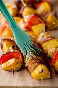 Teriyaki Chicken Kabobs are a healthy low-carb dinner bursting with flavor. These easy kabobs are prepared on the grill or in the oven and are loaded with lean chicken, bell peppers, onions and juicy pineapple for a balanced meal.