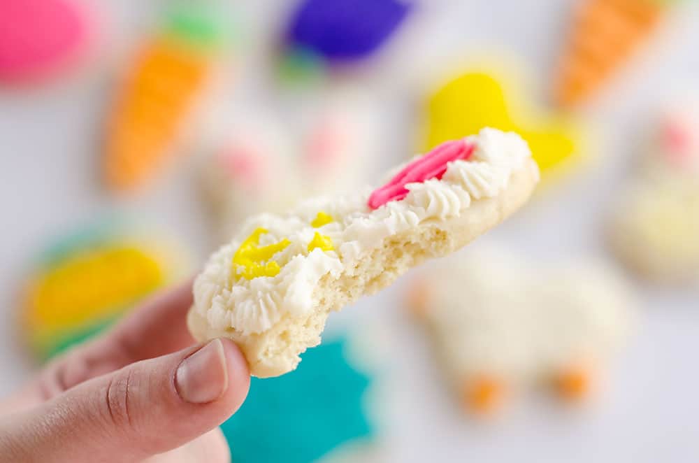 These Frosted Sugar Cookies are the best you will ever try! These adorable spring cut-outs have a cake-like softness topped with a rich buttercream frosting and the perfect balance of sweetness.