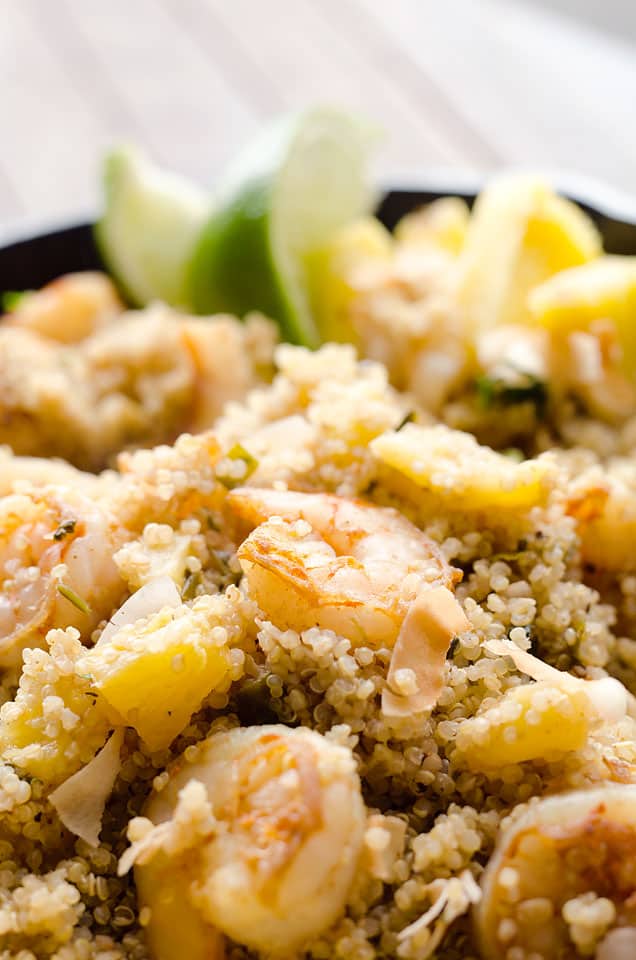 Light Coconut Shrimp & Pineapple Quinoa Skillet is a tropical dinner idea loaded with healthy ingredients. Quinoa, shrimp, pineapple and unsweetened coconut make up this flavorful and delicious dish for a healthy meal everyone will love. 