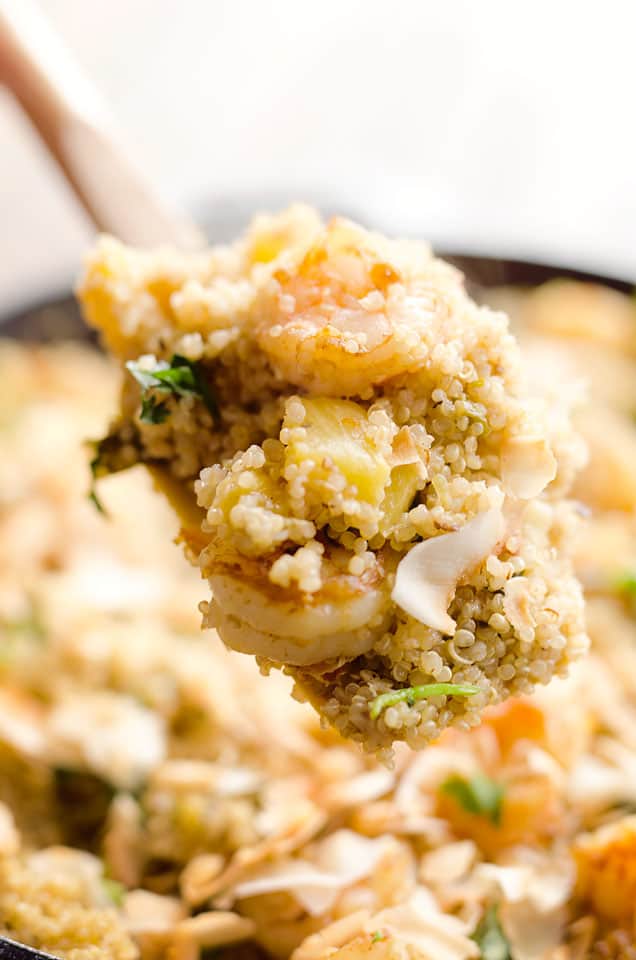 Light Coconut Shrimp & Pineapple Quinoa Skillet is a tropical dinner idea loaded with healthy ingredients. Quinoa, shrimp, pineapple and unsweetened coconut make up this flavorful and delicious dish for a healthy meal everyone will love. 