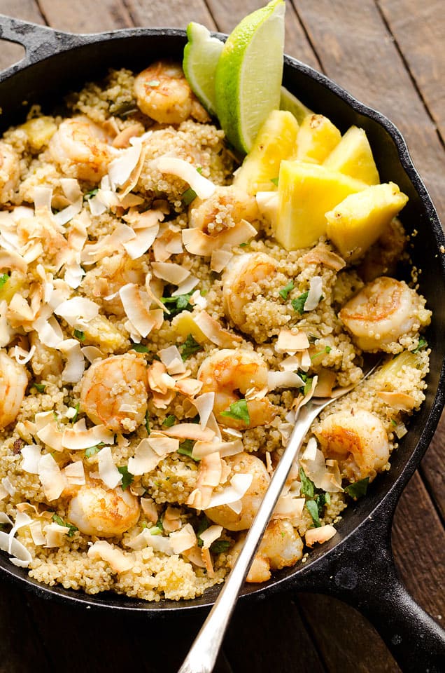 Light Coconut Shrimp & Pineapple Quinoa Skillet is a tropical dinner idea loaded with healthy ingredients. Quinoa, shrimp, pineapple and unsweetened coconut make up this flavorful and delicious dish for a healthy meal everyone will love. 