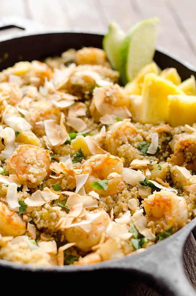 Light Coconut Shrimp & Pineapple Quinoa Skillet is a tropical dinner idea loaded with healthy ingredients. Quinoa, shrimp, pineapple and unsweetened coconut make up this flavorful and delicious dish for a healthy meal everyone will love. 