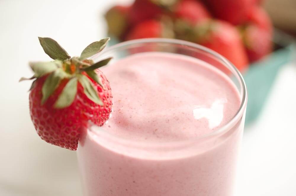 This Coconut Strawberry Protein Smoothie is a fresh and healthy breakfast or snack that will fill you up and satisfy your sweet tooth!