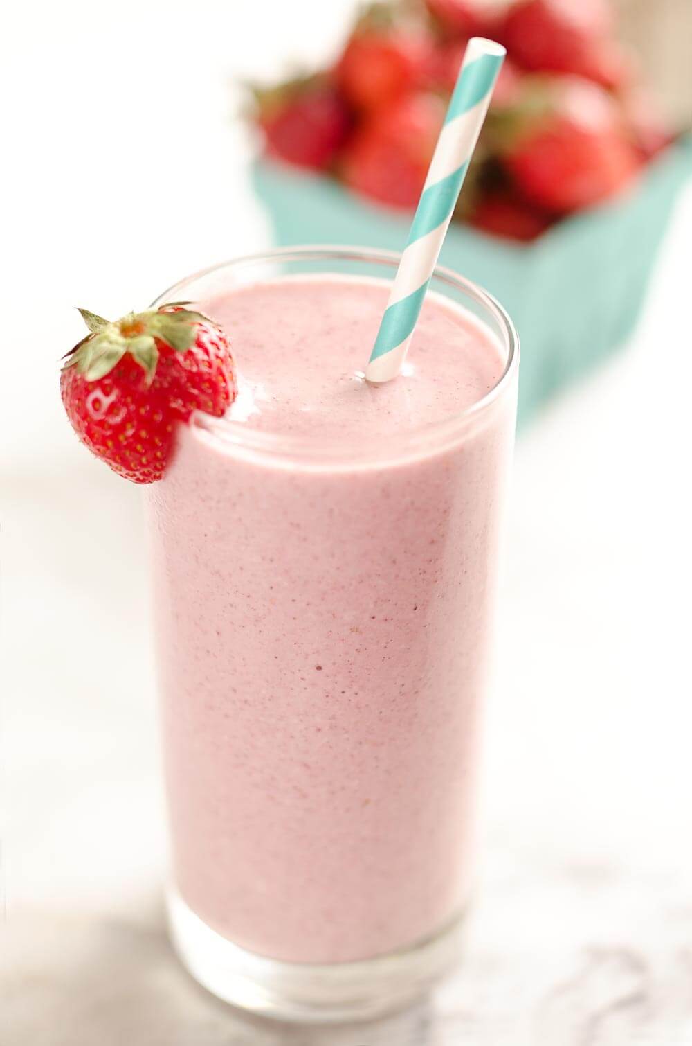 This Coconut Strawberry Protein Smoothie is a fresh and healthy breakfast or snack that will fill you up and satisfy your sweet tooth!