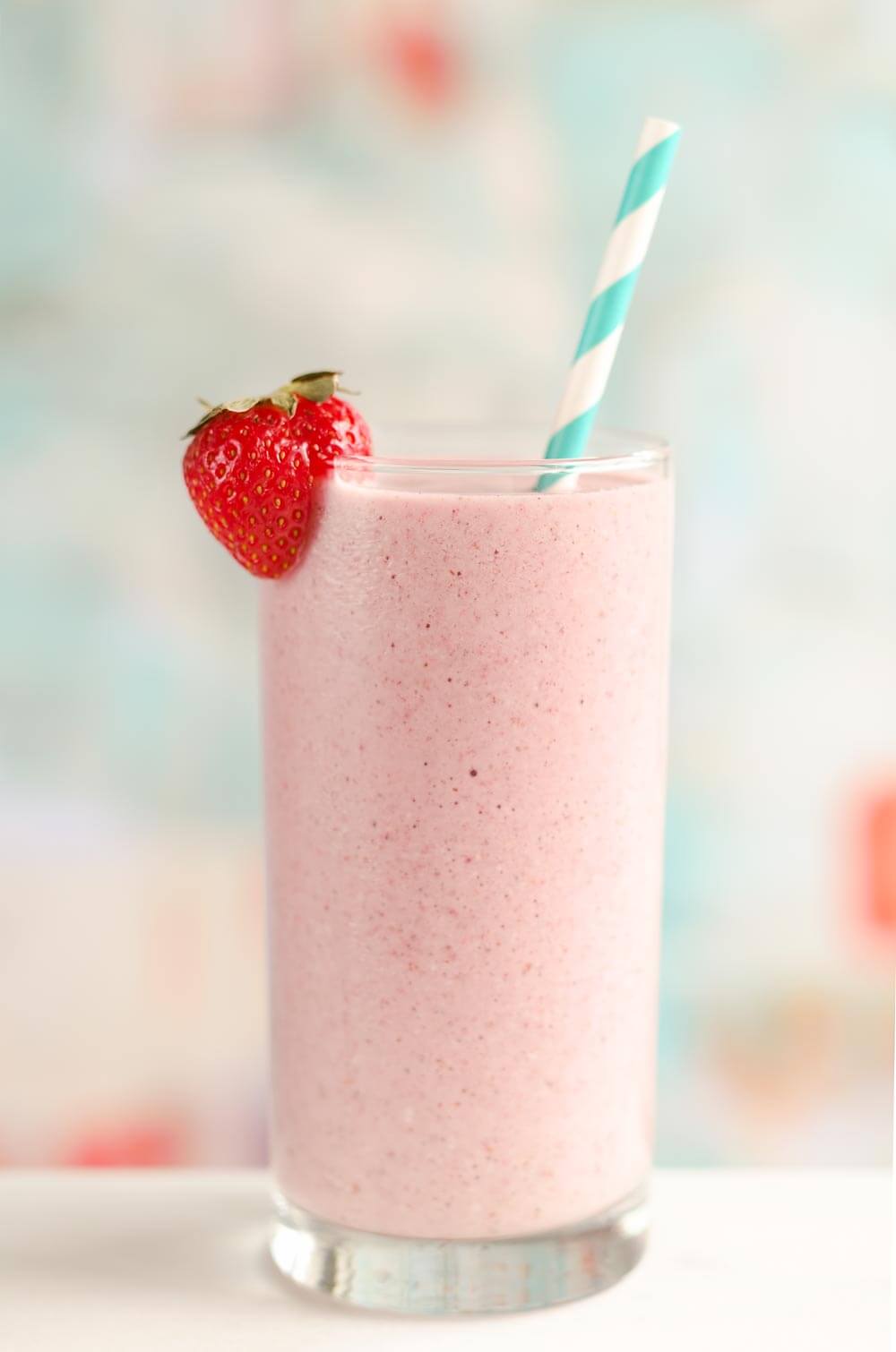 This Coconut Strawberry Protein Smoothie is a fresh and healthy breakfast or snack that will fill you up and satisfy your sweet tooth!