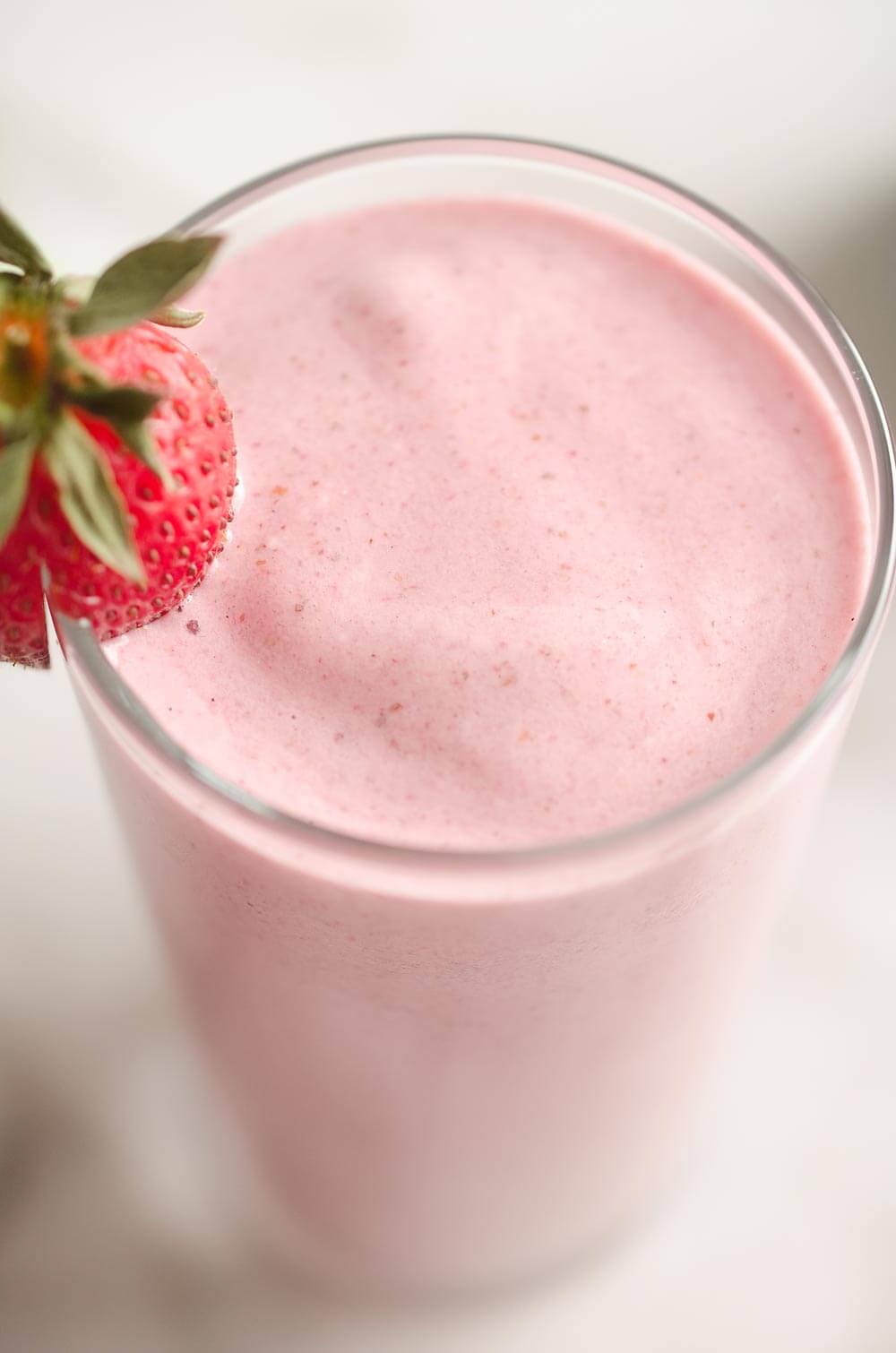 This Coconut Strawberry Protein Smoothie is a fresh and healthy breakfast or snack that will fill you up and satisfy your sweet tooth!