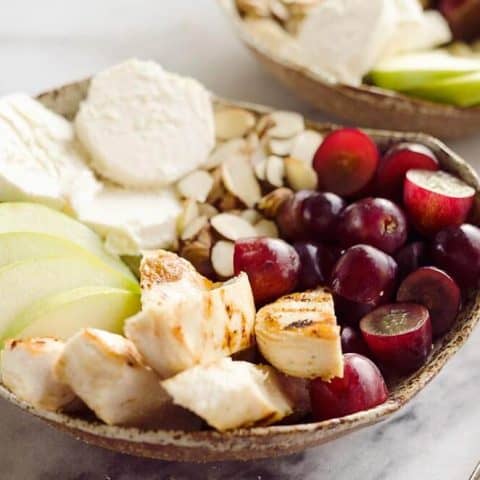 Fruit & Goat Cheese Chicken Bowls are a fresh and easy recipe for a healthy dinner loaded with sweet and savory flavors. Tender chicken breasts are paired with juicy grapes, apples, almonds and creamy honey goat cheese for an amazingly simple meal!