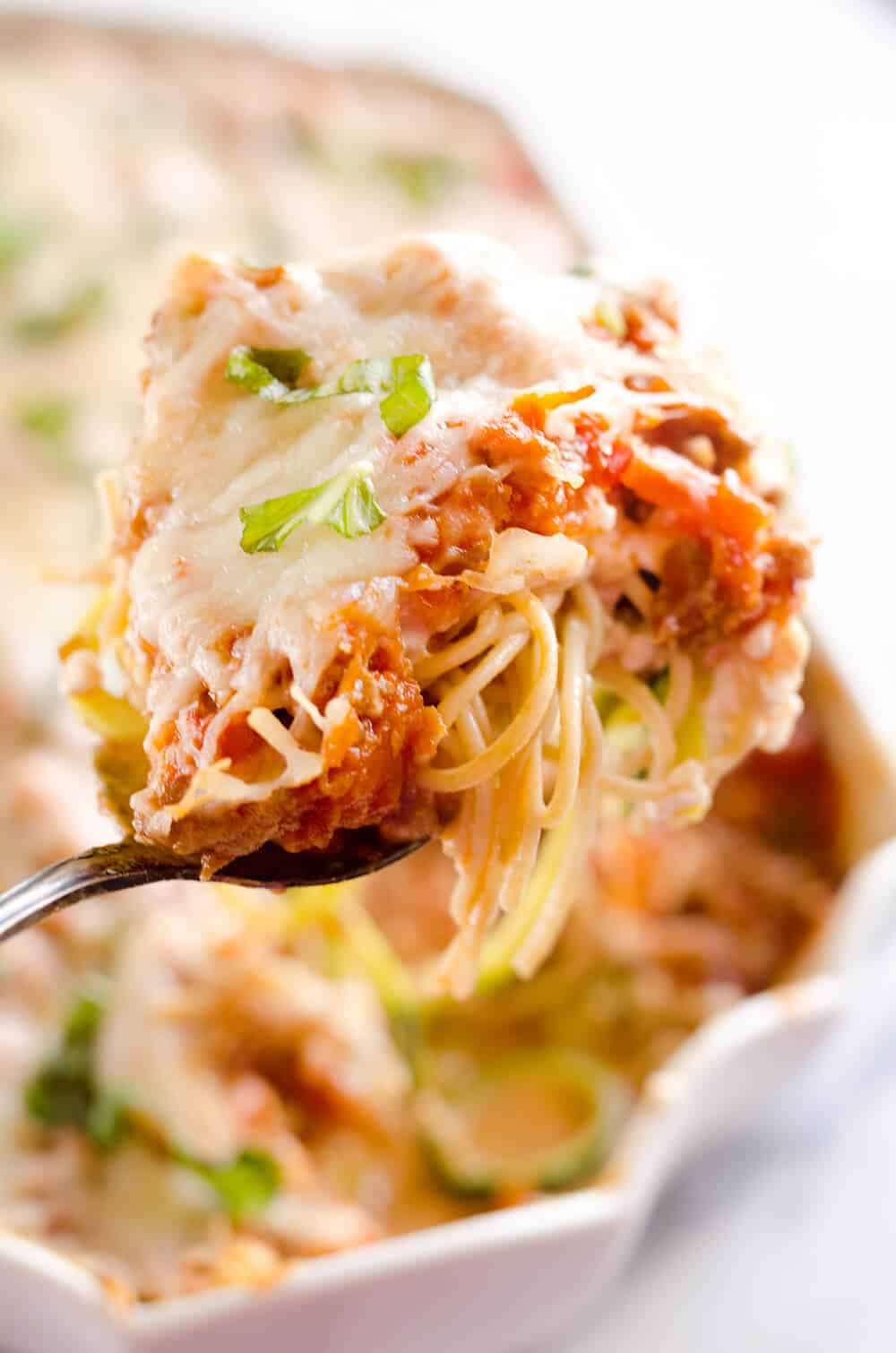 Light Turkey Noodle Casserole is a hearty and healthy dinner idea the whole family will love! All of the traditional flavors of noodle casserole are lightened up with whole wheat spaghetti, zucchini noodles and lean ground turkey.