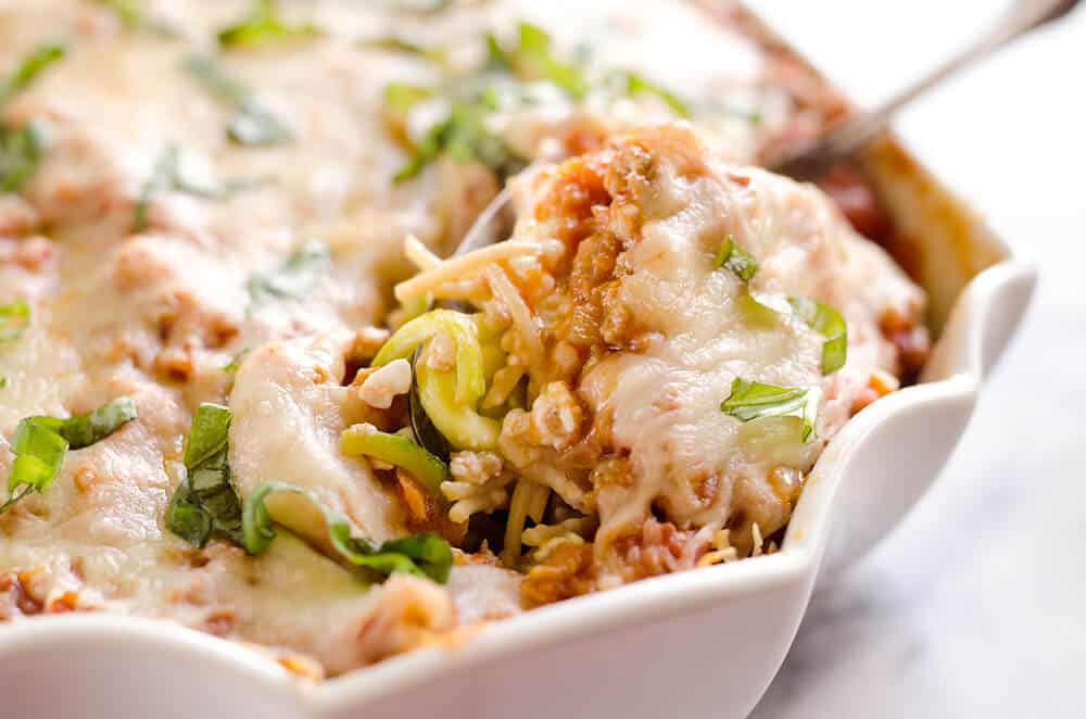 Light Turkey Noodle Casserole is a hearty and healthy dinner idea the whole family will love! All of the traditional flavors of noodle casserole are lightened up with whole wheat spaghetti, zucchini noodles and lean ground turkey.