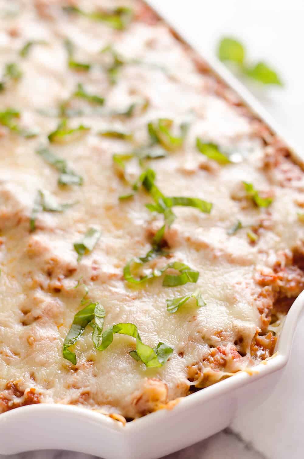 Light Turkey Noodle Casserole is a hearty and healthy dinner idea the whole family will love! All of the traditional flavors of noodle casserole are lightened up with whole wheat spaghetti, zucchini noodles and lean ground turkey. 