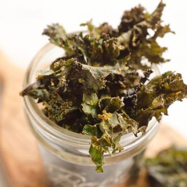 Spicy Kale Chips are beautifully crisp and loaded with bold chipotle flavor for a healthy snack. They are perfect for the munchies or paired with your favorite sandwich on the side!