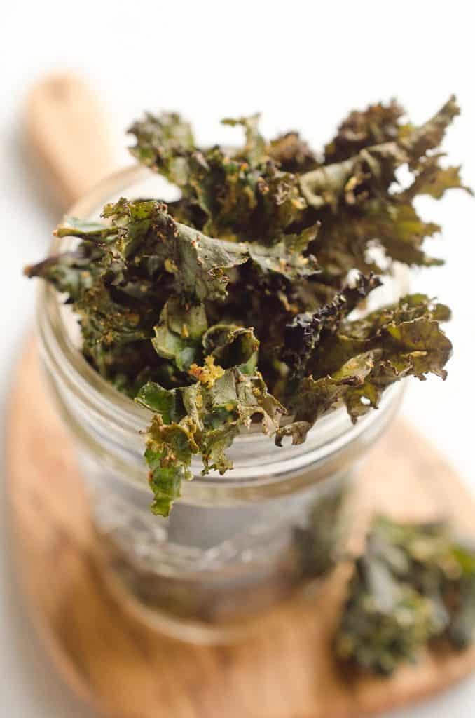 Spicy Kale Chips are beautifully crisp and loaded with bold chipotle flavor for a healthy snack. They are perfect for the munchies or paired with your favorite sandwich on the side!