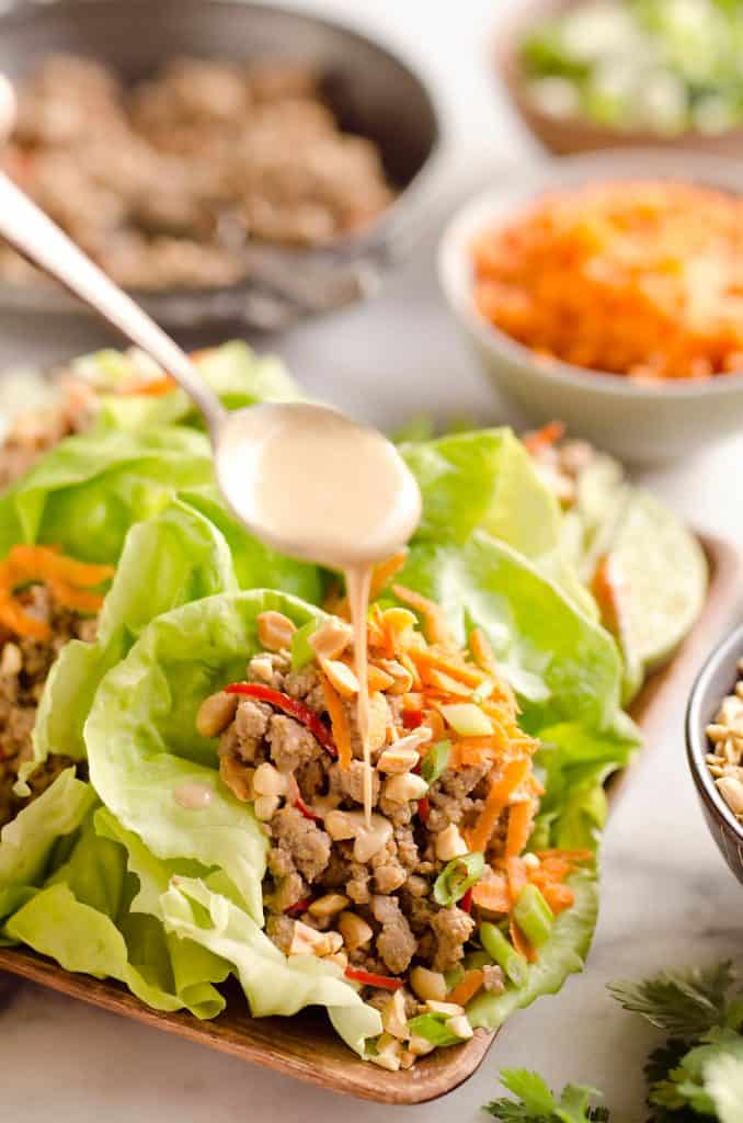 Turkey Thai Peanut Lettuce Wraps are a light and healthy dinner idea packed with filling ground turkey, fresh vegetables and crunch peanuts. This is a dinner idea you can enjoy over and over, it is simply that good!