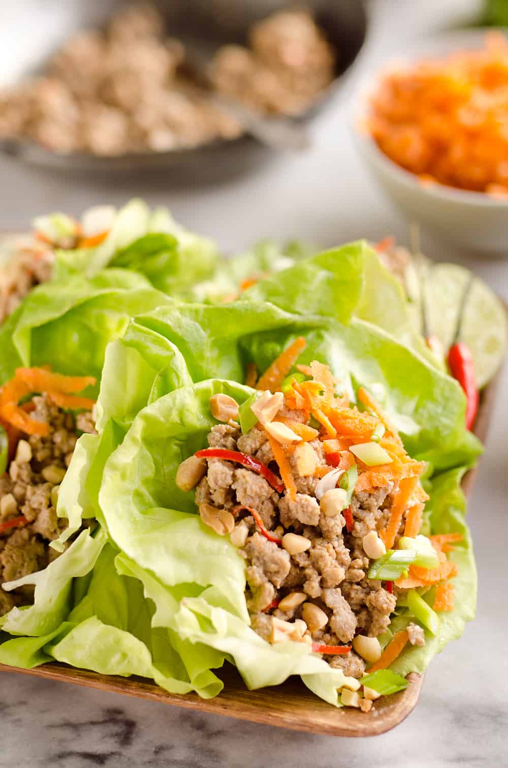 Turkey Thai Peanut Lettuce Wraps are a light and healthy dinner idea packed with filling ground turkey, fresh vegetables and crunch peanuts. This is a dinner idea you can enjoy over and over, it is simply that good!