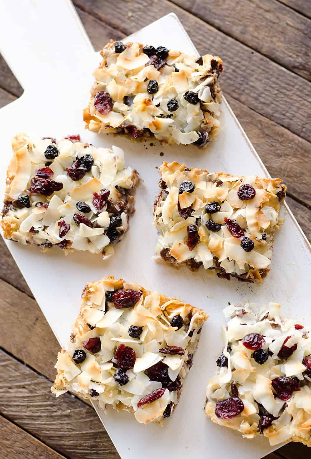 Berry Coconut Magic Bars are amazingly easy to whip together and have the great flavors of chocolate and dried berries for a fun twist on a classic dessert. 