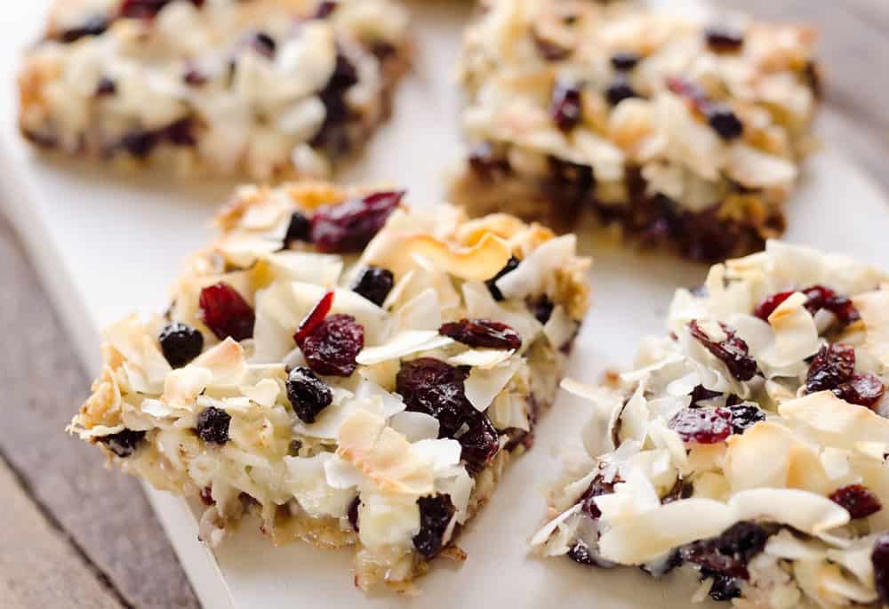 Berry Coconut Magic Bars are amazingly easy to whip together and have the great flavors of chocolate and dried berries for a fun twist on a classic dessert. 