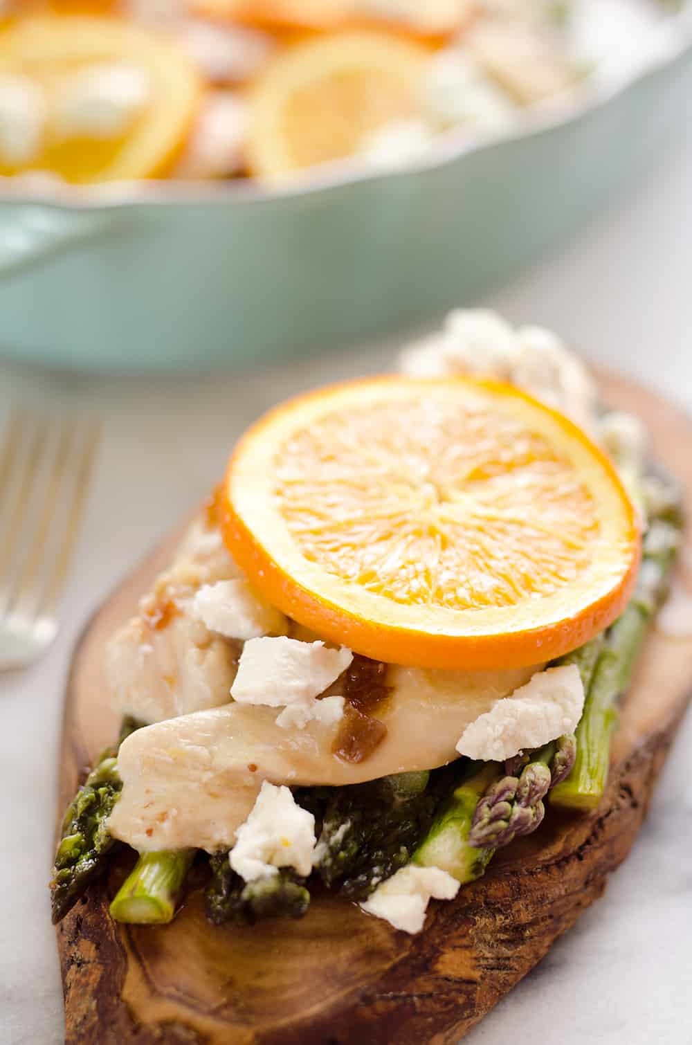 Fig & Orange Chicken Asparagus Bake is an easy and healthy one pot recipe with fresh and flavorful ingredients. Bright citrus flavor and creamy goat cheese compliment the tender chicken breasts and asparagus for a wholesome meal you will love. 