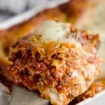 This Lasagna Recipe from my grandmother is a hearty casserole that is a classic dinner everyone will love! Ground beef and pork are layered with cheese and pasta for a comforting dinner idea perfect for a family gathering or holiday. After you have satisfied everyone's appetites with this amazing dish, clean up with all-natural Evolve dish soap for a clean and sparkling kitchen!