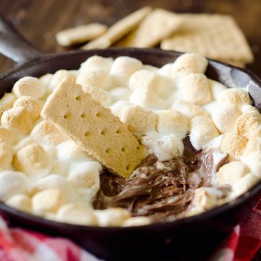 Peanut Butter S'mores Dip is the perfect sweet treat any time of year! It's made with just three ingredients and none of the smokey mess of the traditional dessert. Enjoy all the great flavors of S'mores with a peanut butter twist for a family friendly treat!