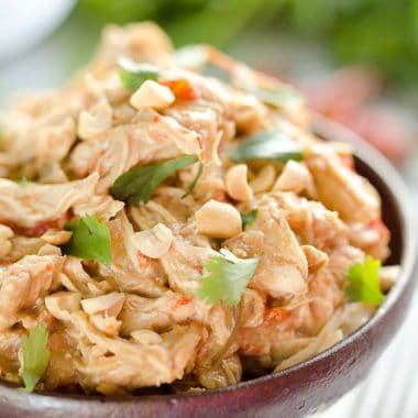 Crock Pot Thai Peanut Chicken is an easy weeknight dinner idea you can make with everything from rice and veggies to lettuce cups for a healthy and delicious meal!