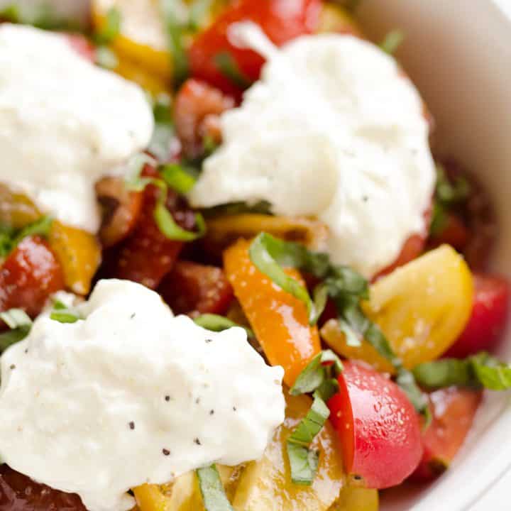 Fresh Tomato Basil & Burrata Salad is a healthy and delicious salad made with simple ingredients for a side dish that pairs well with just about everything!