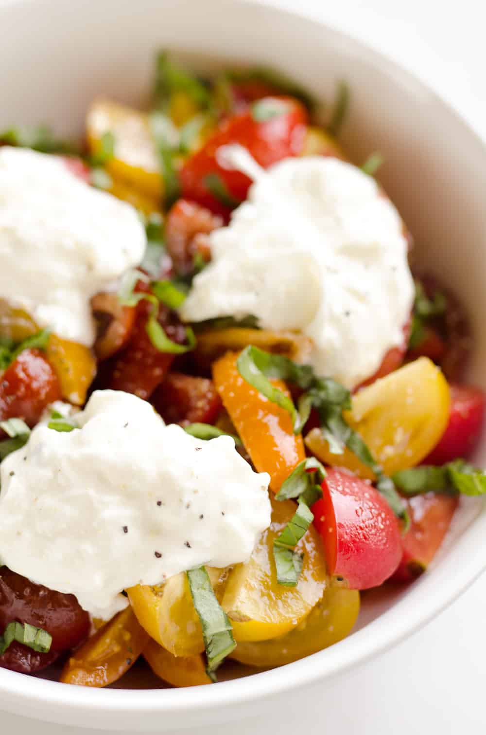 Fresh Tomato Basil & Burrata Salad is a healthy and delicious salad made with simple ingredients for a side dish that pairs well with just about everything!