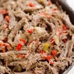 Pressure Cooker Shredded Italian Beef is an easy no fuss recipe made with simple ingredients! Serve this beef along with your favorite veggies for a healthy low-carb dinner idea or pile it high on fresh buns for a delicious sandwich!