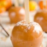 Salted Caramel Apples are fresh tart apples coated in a rich homemade salted caramel for the perfect fall treat!