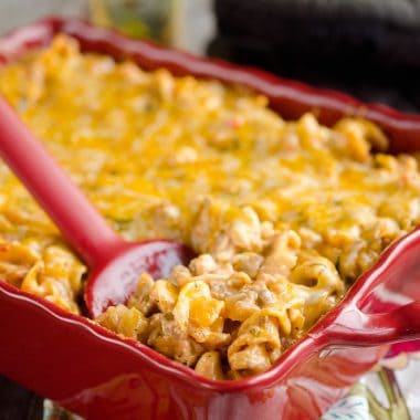 Sour Cream Cheesy Hamburger Hotdish is an easy and comforting dinner idea full of hearty hamburger, vegetables and pasta. This family friendly recipe is sure to be a staple in your meal plans!