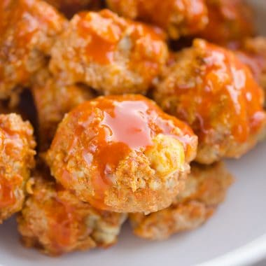 Light Crock Pot Buffalo Turkey Meatballs are an easy recipe made in your slow cooker bursting with bold flavor from spicy buffalo sauce and bleu cheese crumbles! Serve them as an appetizer on game day or pair them with a side of rice and veggies for a flavorful dinner.