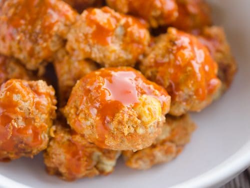 Light Crock Pot Buffalo Turkey Meatballs are an easy recipe made in your slow cooker bursting with bold flavor from spicy buffalo sauce and bleu cheese crumbles! Serve them as an appetizer on game day or pair them with a side of rice and veggies for a flavorful dinner.