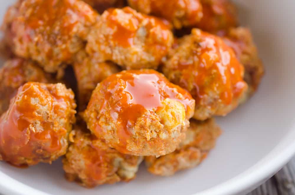 Light Crock Pot Buffalo Turkey Meatballs are an easy recipe made in your slow cooker bursting with bold flavor from spicy buffalo sauce and bleu cheese crumbles! Serve them as an appetizer on game day or pair them with a side of rice and veggies for a flavorful dinner.